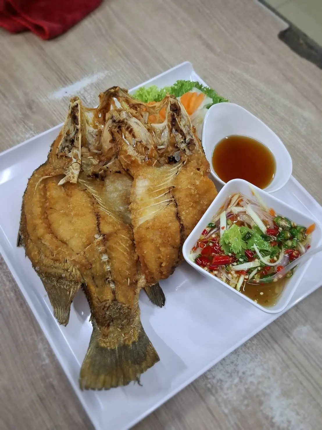 ปลากระพงราดน้ำปลา